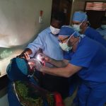 eye doctor examining patient