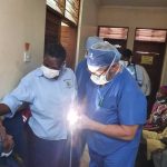 eye doctor examining patient